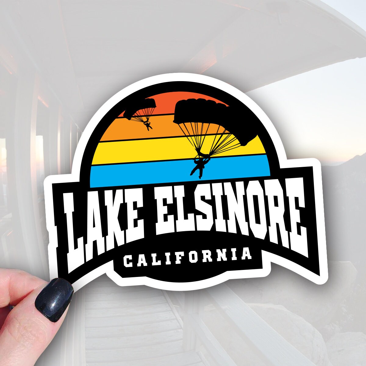 sticker that says lake elsinore with parachutes