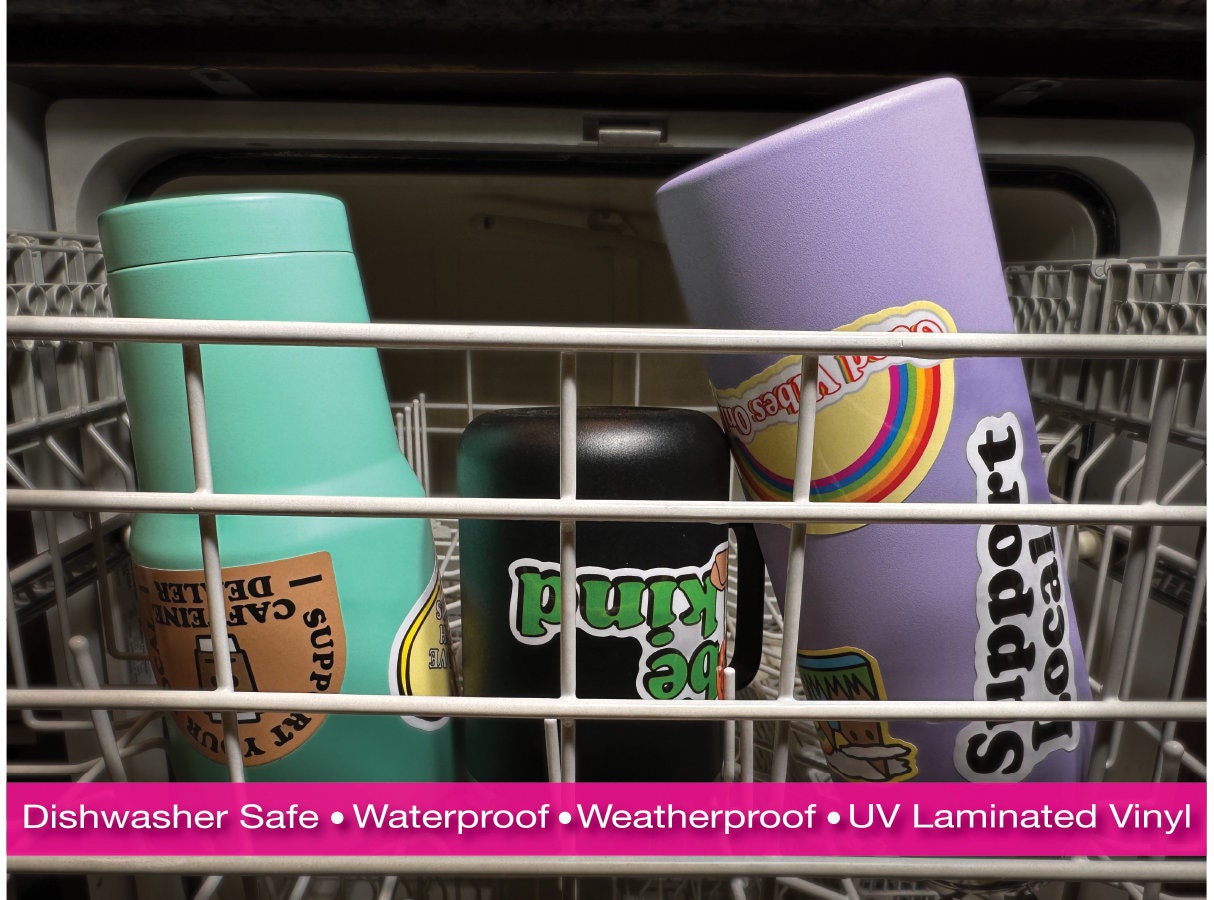 a dishwasher basket filled with different colored cups