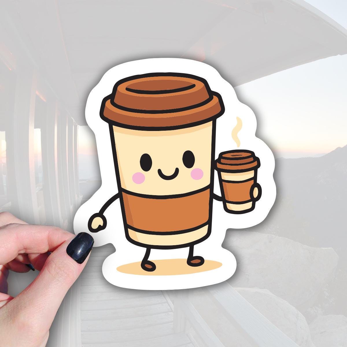 A cartoon coffee cup character holding a coffee cup, with a persons hand holding the sticker in the foreground.